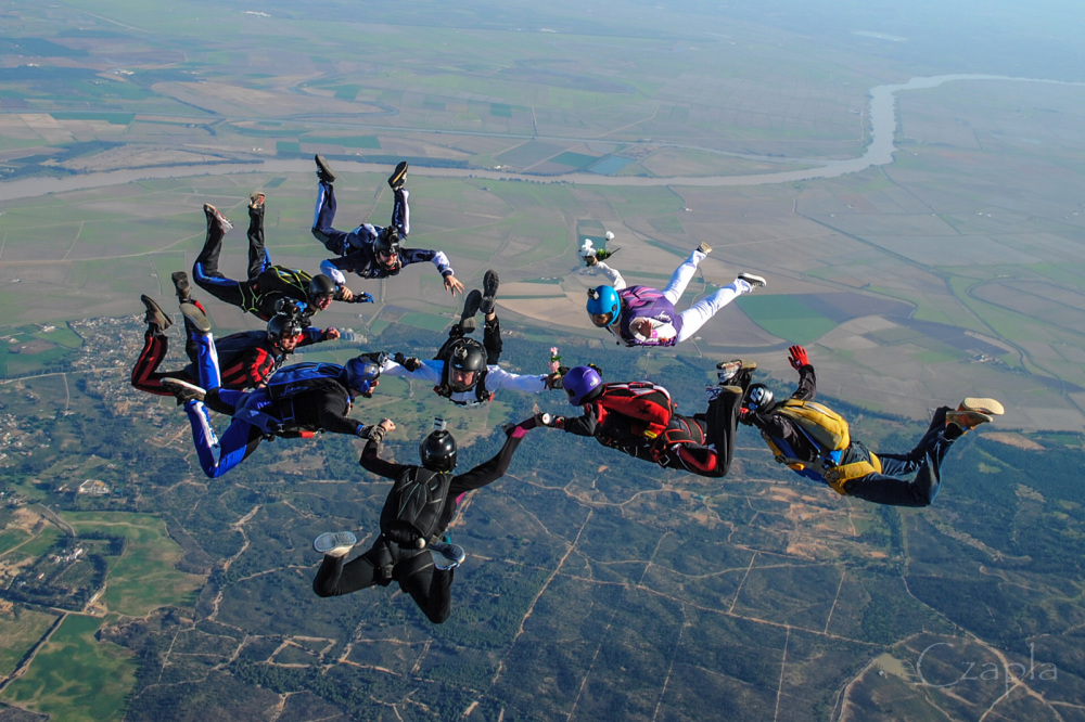 nine members on a group skydive
